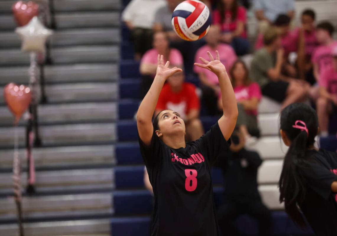 Coronado's Alyssa Leone (8) sets the ball during a volleyball game against Foothill at Cor ...