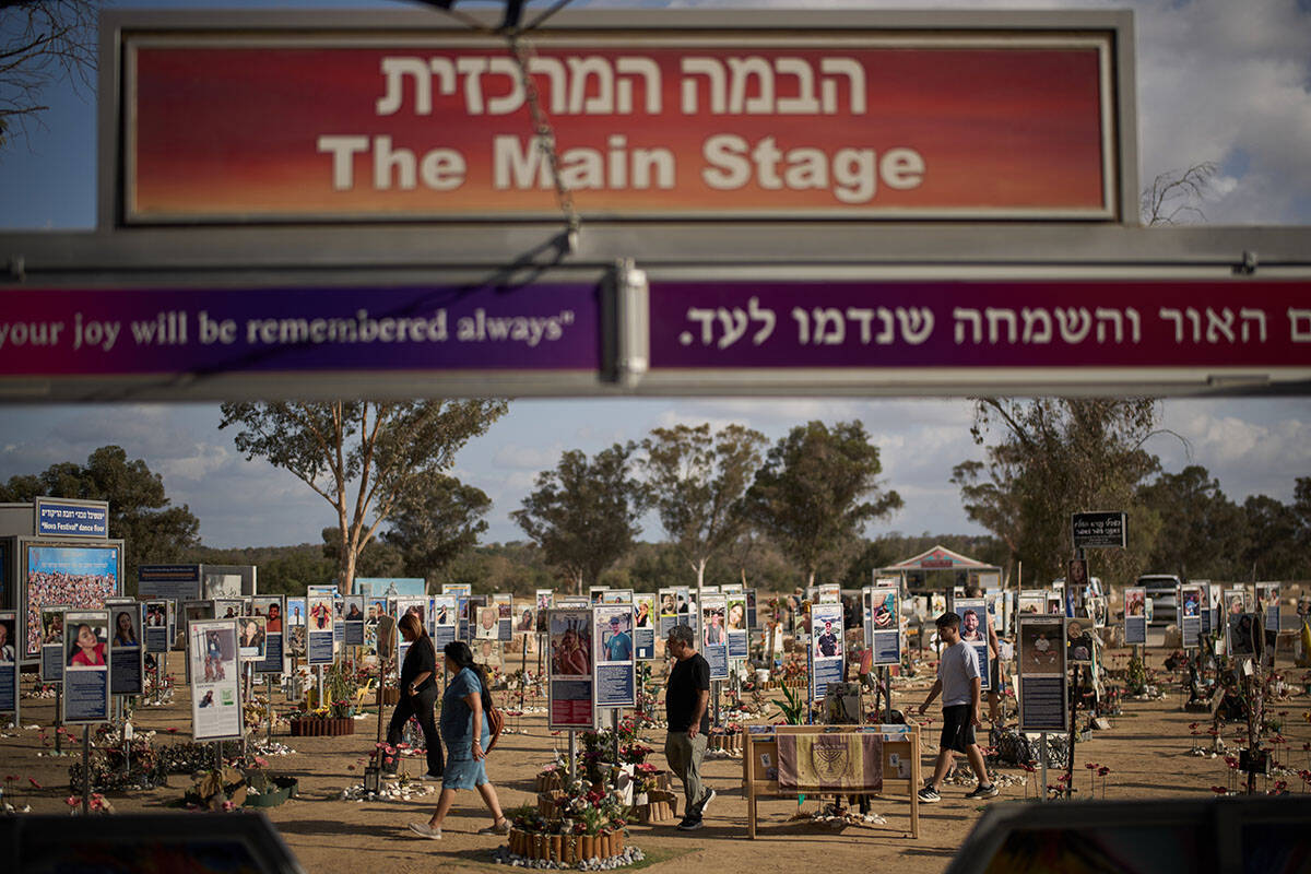 Relatives and friends visit the site where revellers were killed and kidnapped on Oct. 7, 2023, ...