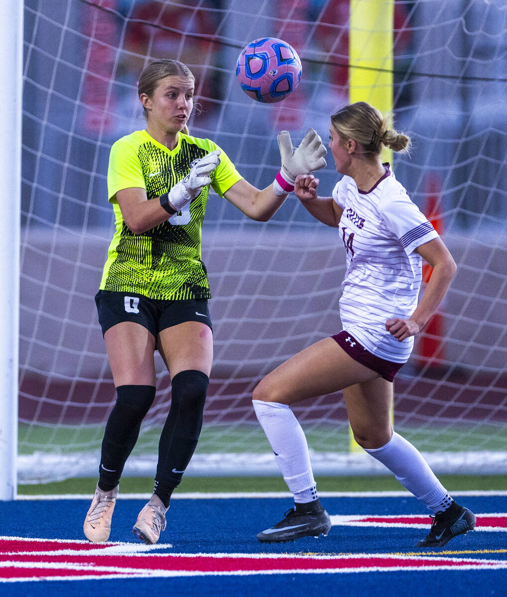 Coronado goalie Lilian Foss (0) looks in a bouncing ball against Faith Lutheran's Kloe Abd ...