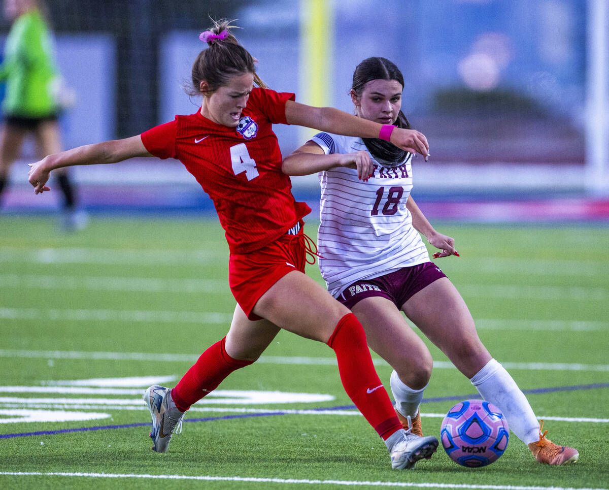 Coronado's Ella Schultz (4) battles for the ball with Faith Lutheran's Addison Jarvis ...
