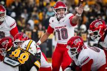 UNLV quarterback Anthony Colandrea calls and audible during their game against University of Wy ...