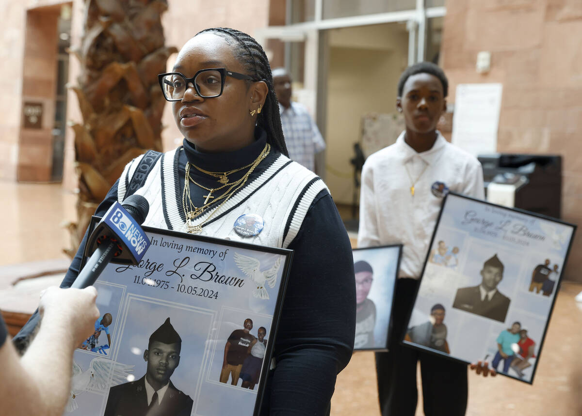 Amaris Davis, a cousin of George Brown, a DUI crash victim, speaks to the media after attending ...
