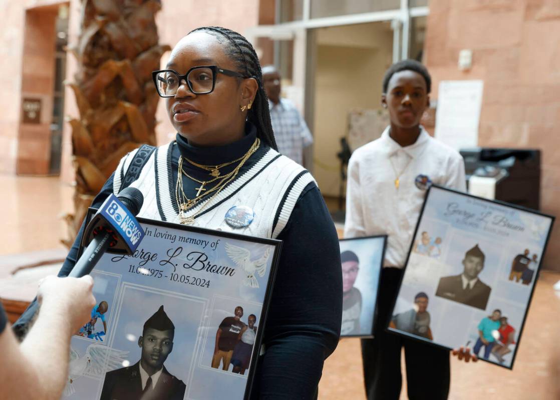 Amaris Davis, a cousin of George Brown, a DUI crash victim, speaks to the media after attending ...