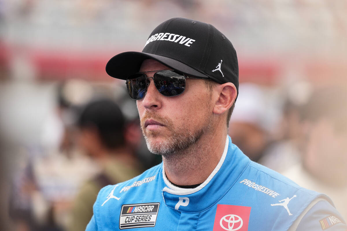 Denny Hamlin looks on prior to a NASCAR Cup Series auto race at Charlotte Motor Speedway, Sunda ...