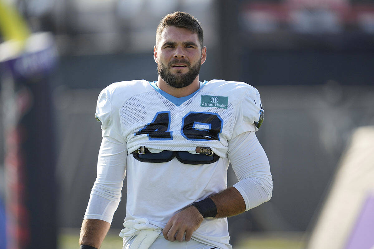 Carolina Panthers linebacker Jon Rhattigan arrives for a joint NFL football practice with the H ...