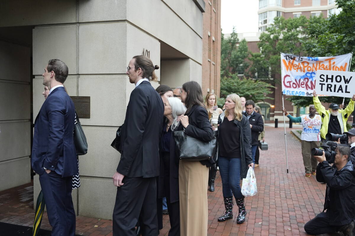 Family of former FBI Director James Comey and others, arrive at federal court in Alexandria, Va ...