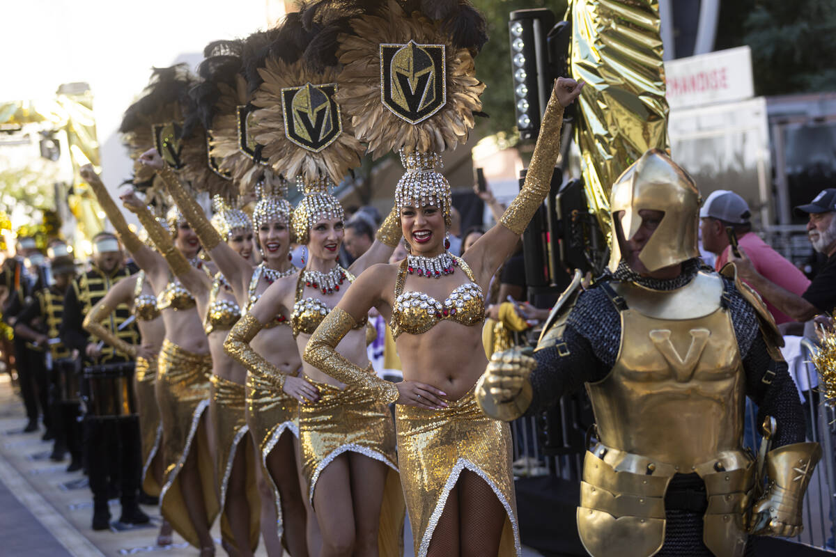 The Vegas Belles walk the gold carpet with the Golden Knight ahead of the team's season-op ...
