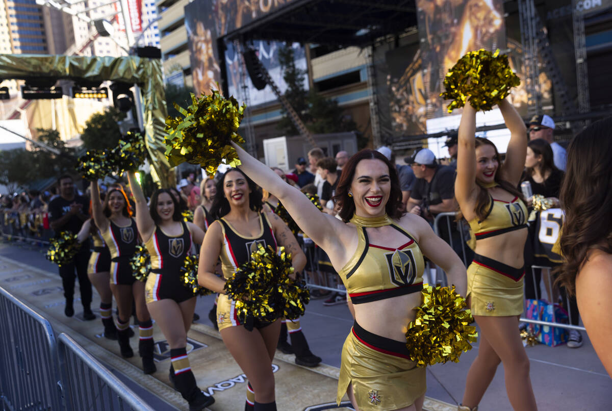 The Vegas Vivas walk the gold carpet ahead of the team's season-opening NHL hockey game ag ...