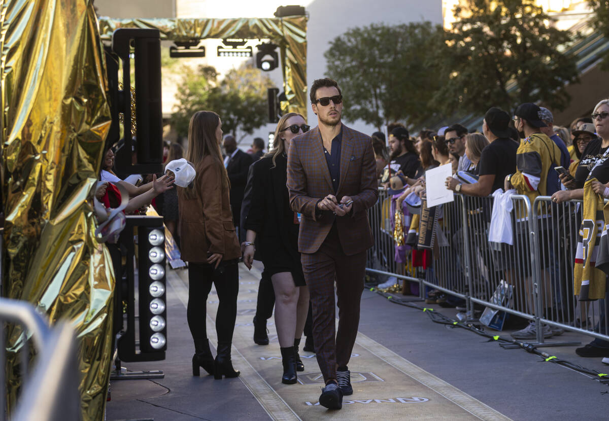Golden Knights right wing Reilly Smith walks the gold carpet ahead of the team's season-op ...