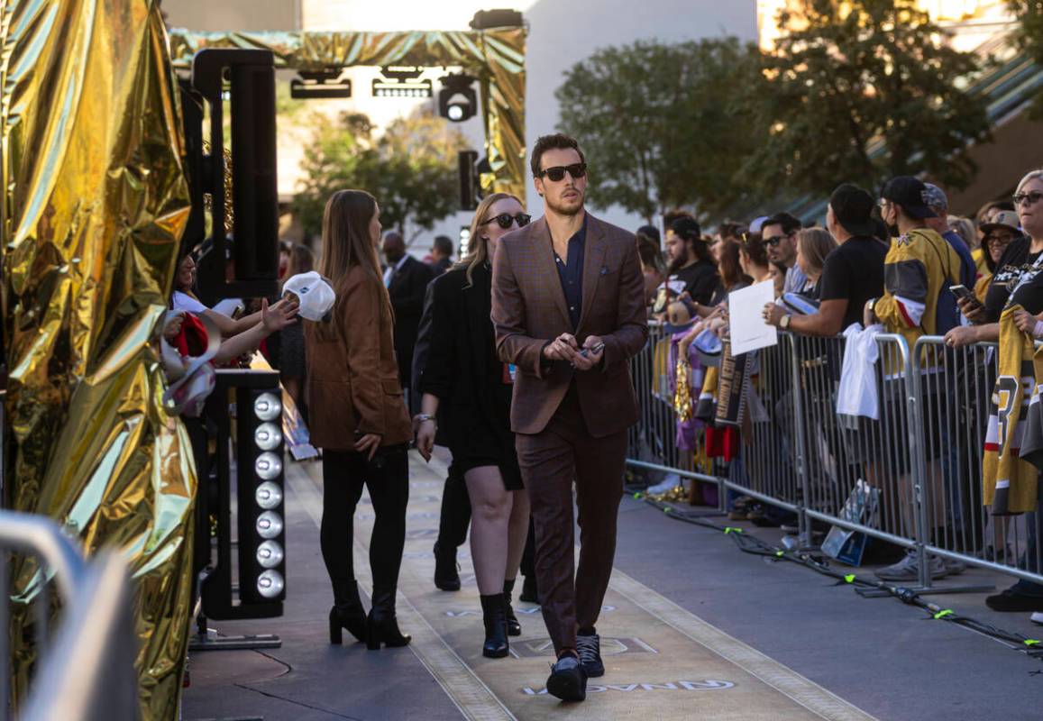 Golden Knights right wing Reilly Smith walks the gold carpet ahead of the team's season-op ...