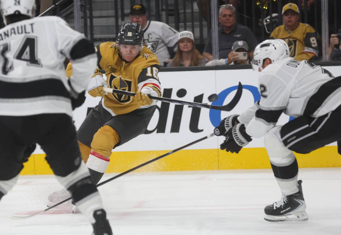 Golden Knights right wing Pavel Dorofeyev (16) passes the puck past Los Angeles Kings defensema ...