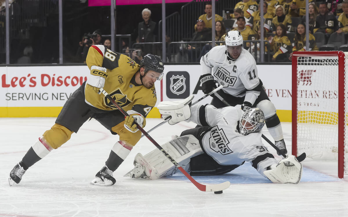 Los Angeles Kings goaltender Anton Forsberg (31) reaches out to block the shot of Golden Knight ...