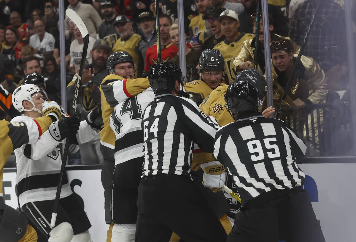 The Golden Knights fight the Los Angeles Kings during the second period of their season-opening ...