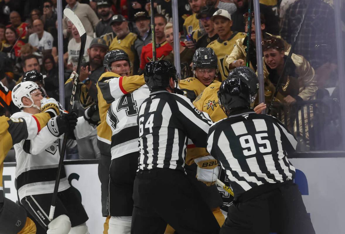 The Golden Knights fight the Los Angeles Kings during the second period of their season-opening ...