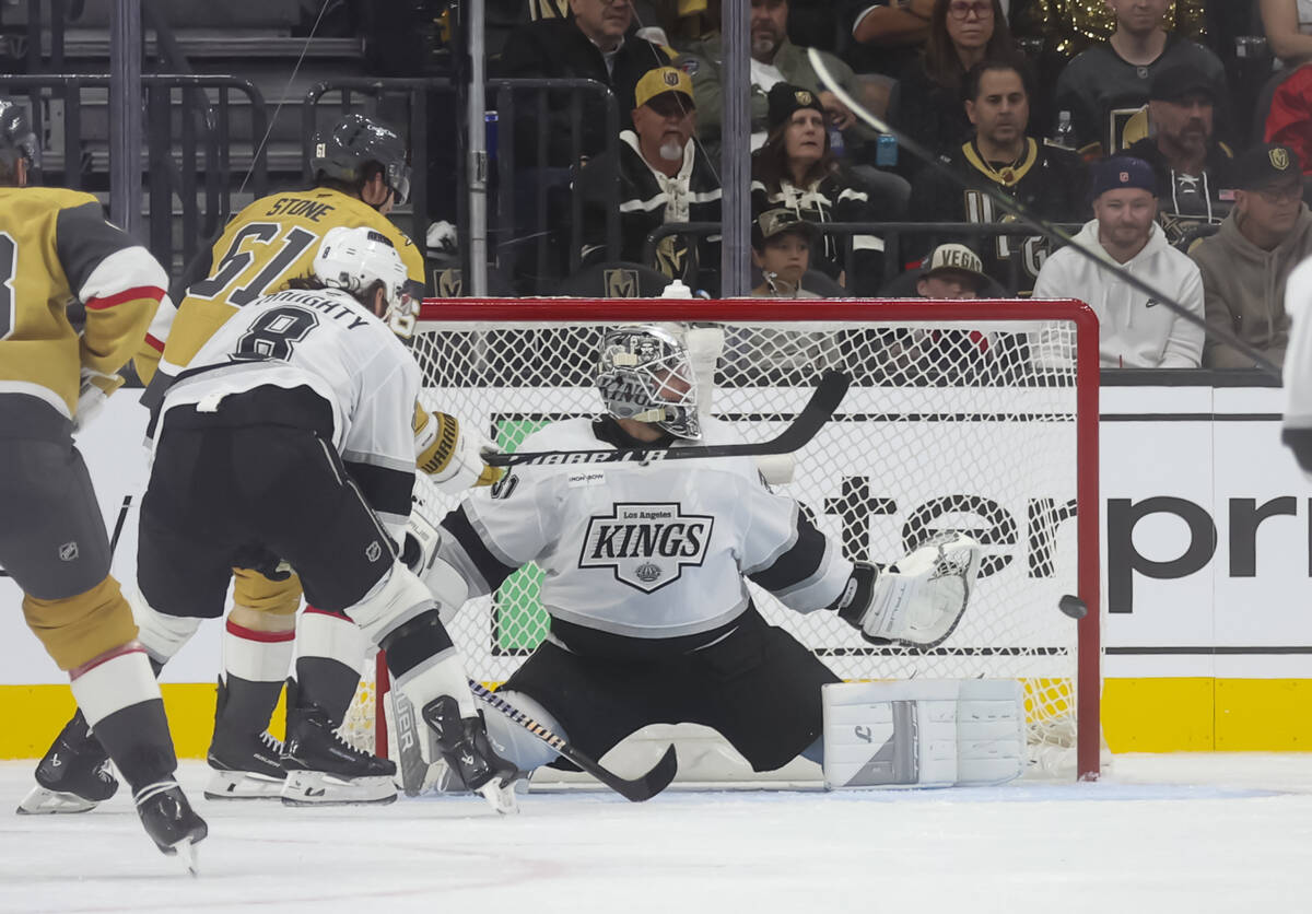 Golden Knights right wing Pavel Dorofeyev, out of frame, scores past Los Angeles Kings goaltend ...