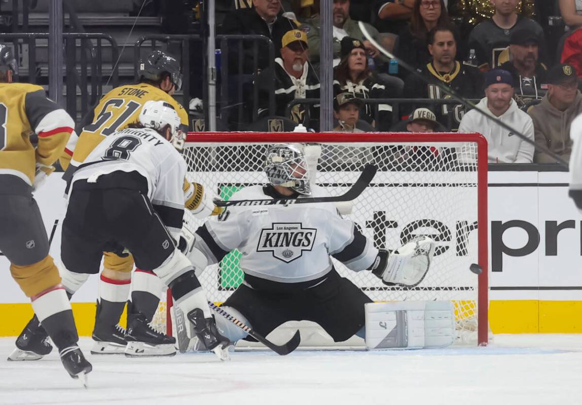 Golden Knights right wing Pavel Dorofeyev, out of frame, scores past Los Angeles Kings goaltend ...