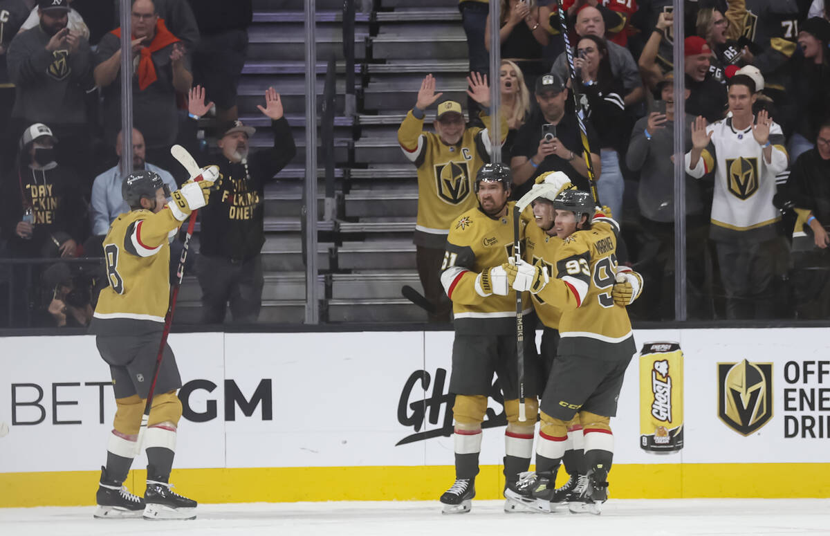 The Golden Knights celebrate a goal by Golden Knights right wing Pavel Dorofeyev (16) during th ...
