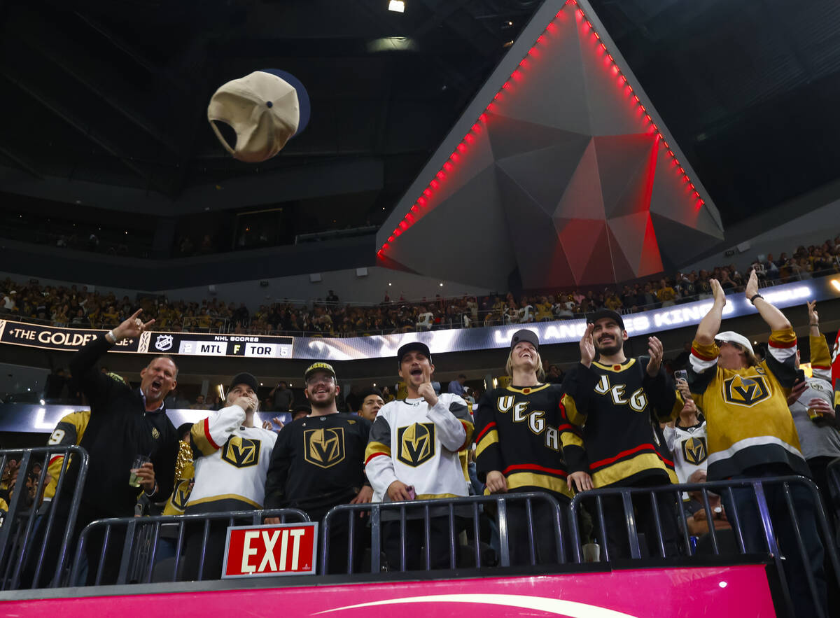 Golden Knights fans celebrate a hat trick goal by Golden Knights right wing Pavel Dorofeyev, ou ...