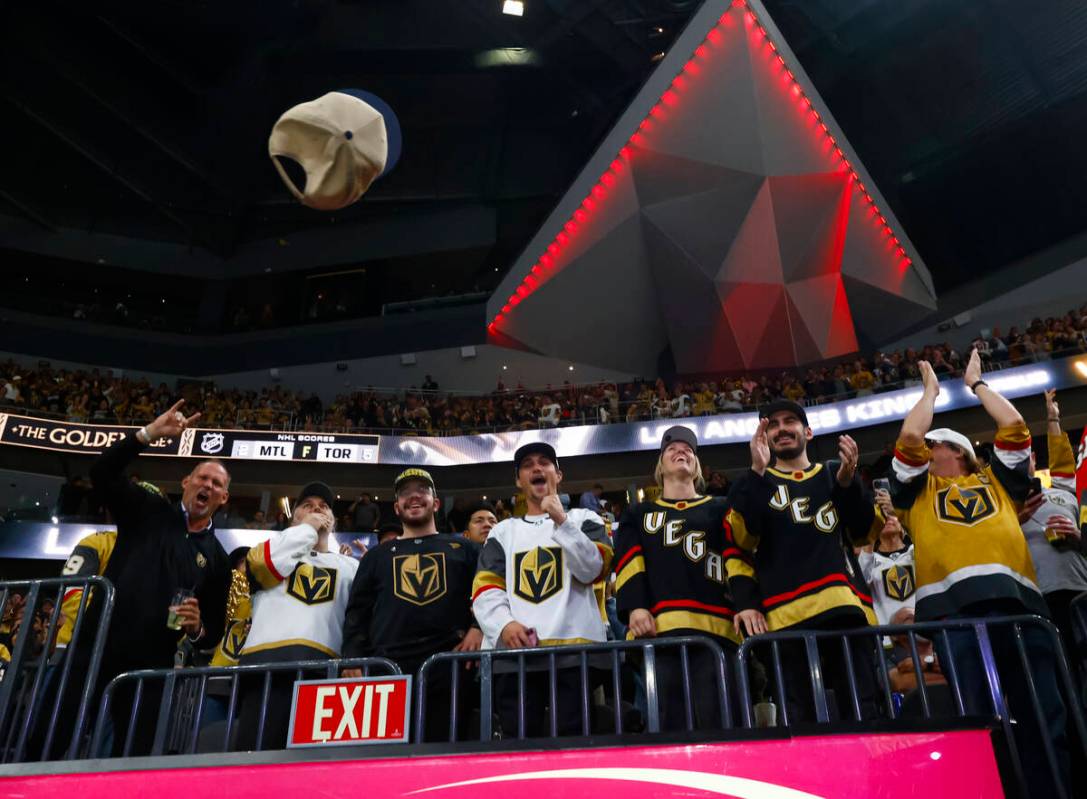 Golden Knights fans celebrate a hat trick goal by Golden Knights right wing Pavel Dorofeyev, ou ...