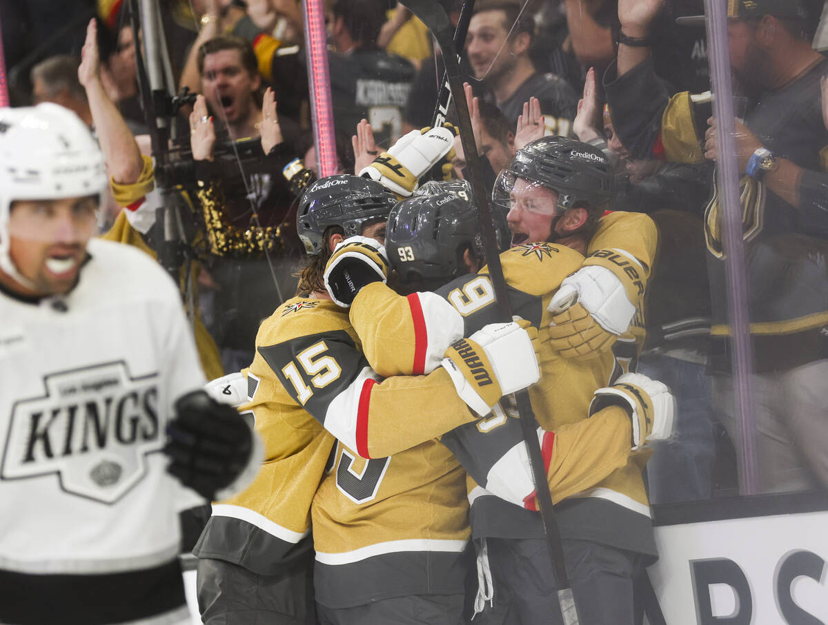 Golden Knights center Jack Eichel (9) celebrates after assisting on a goal by Golden Knights le ...