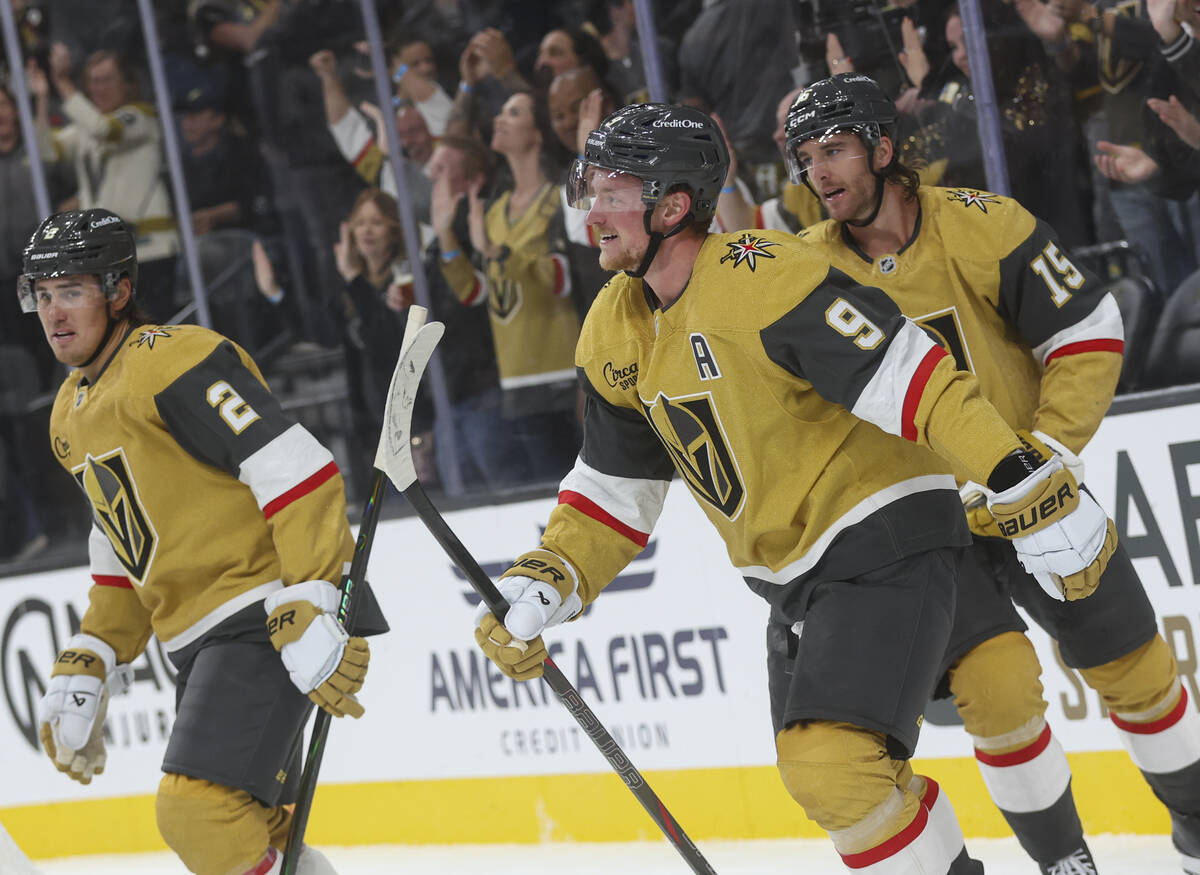 Golden Knights center Jack Eichel (9) celebrates after assisting on a goal by Golden Knights le ...