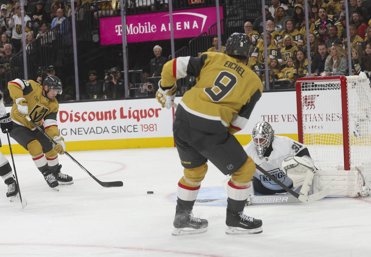 Golden Knights center Jack Eichel (9) passes the puck to Golden Knights left wing Ivan Barbashe ...