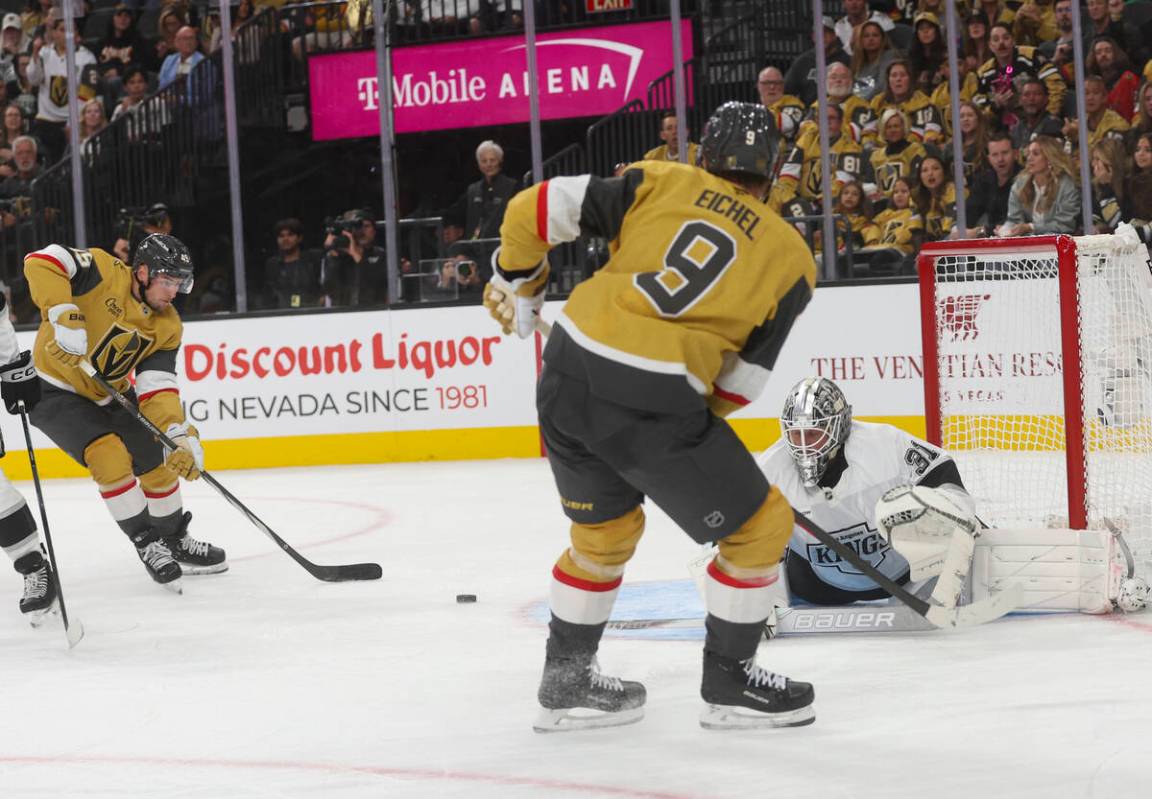 Golden Knights center Jack Eichel (9) passes the puck to Golden Knights left wing Ivan Barbashe ...