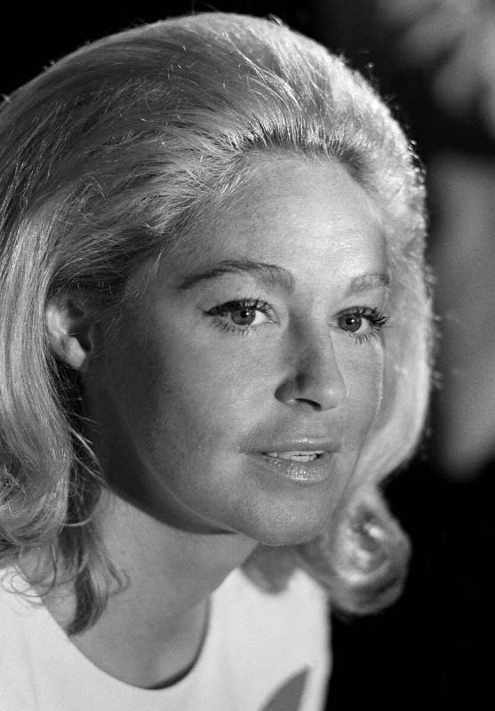 FILE - Joan Kennedy listens in Boston, Mass., on Monday, Sept. 23, 1974, as her husband, Massac ...