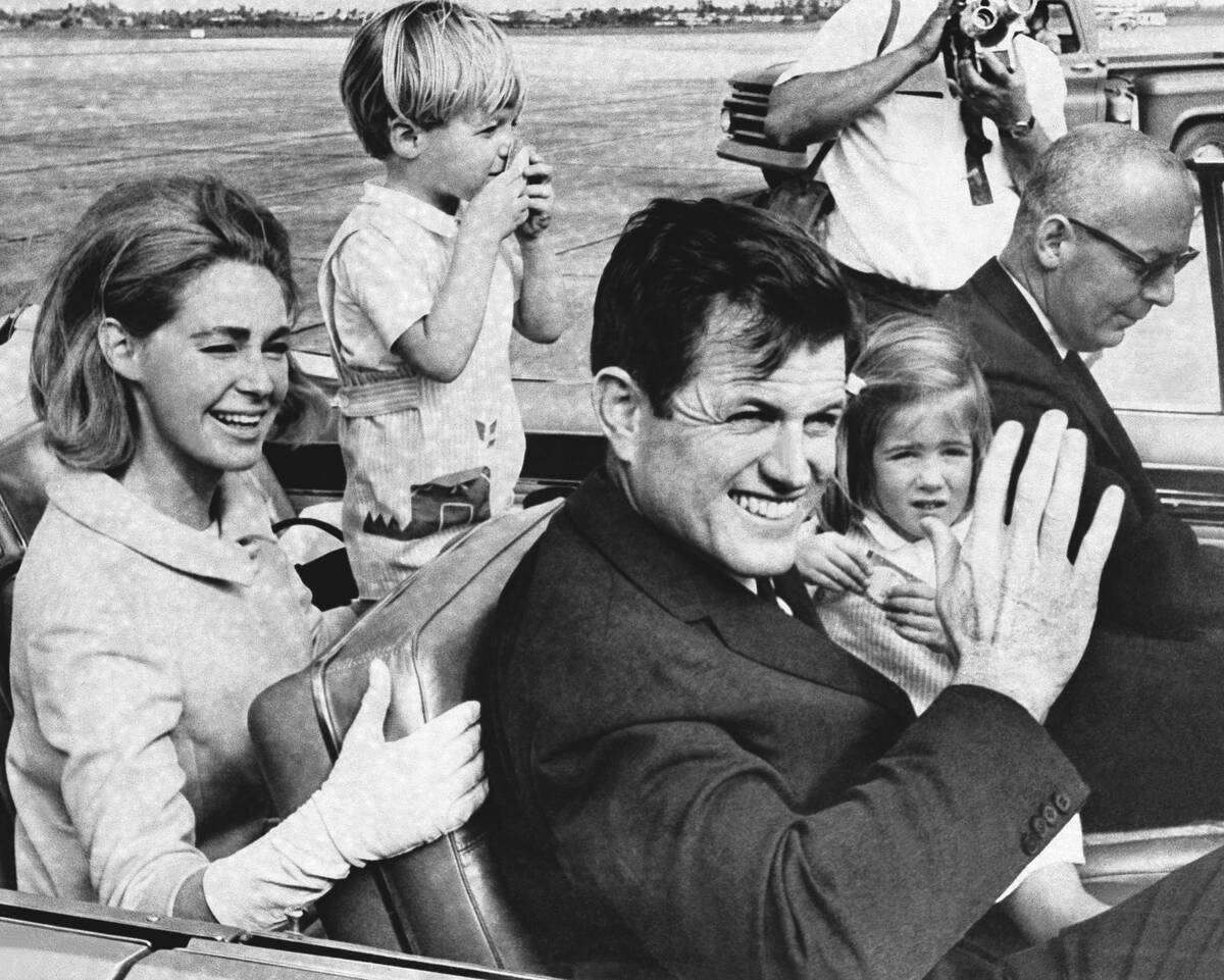FILE - Senator Edward Kennedy and Wife Joan Kennedy leave West Palm Beach airport for the drive ...