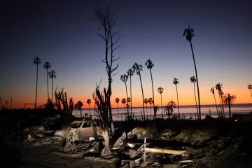 FILE - The devastation of the Palisades Fire is seen at sunset in the Pacific Palisades neighb ...