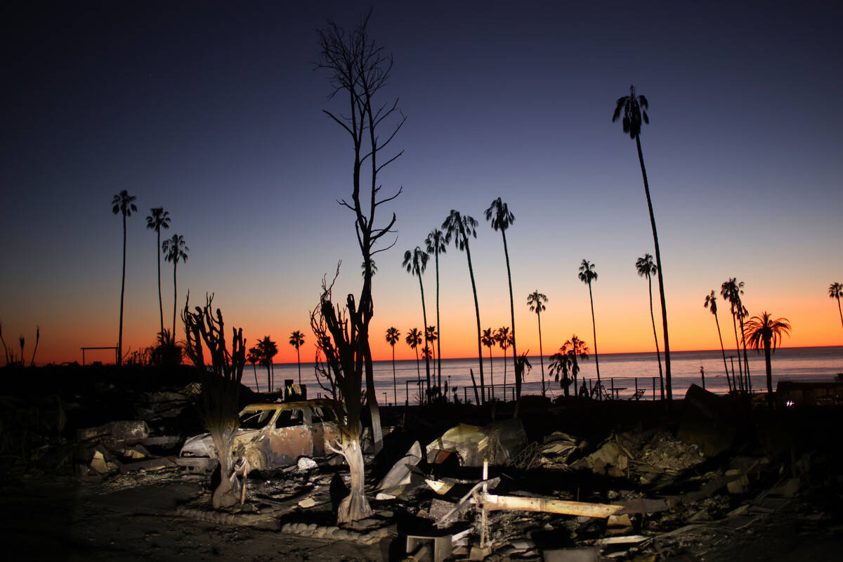 FILE - The devastation of the Palisades Fire is seen at sunset in the Pacific Palisades neighb ...