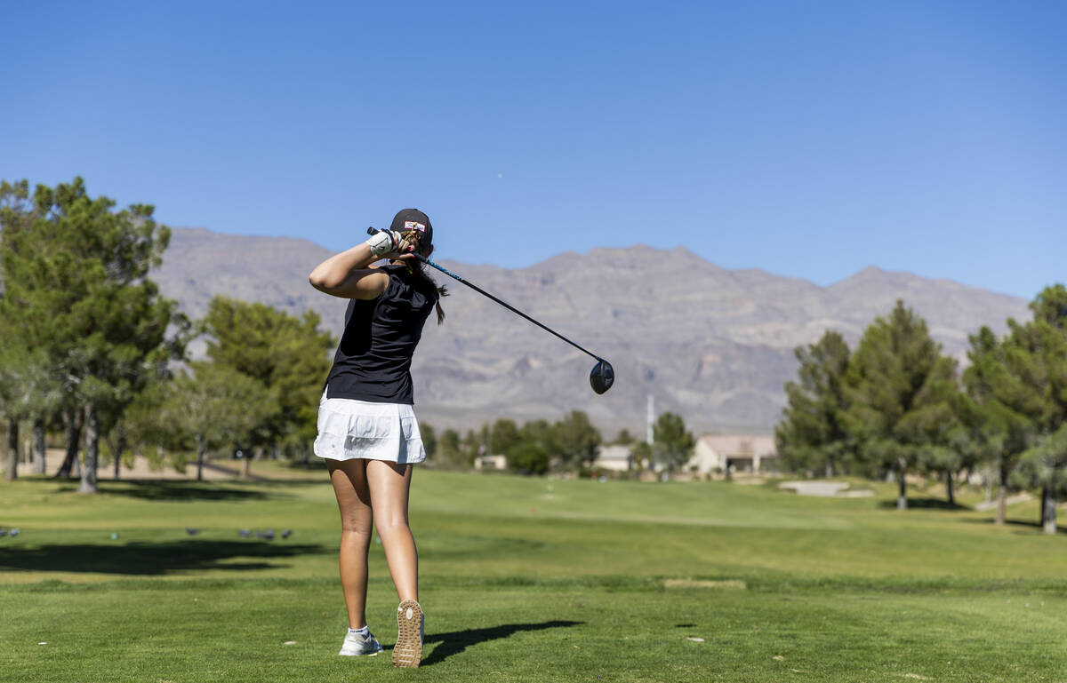 Faith Lutheran's Madison Perez watches a tee shot fly down the fairway during the final ro ...