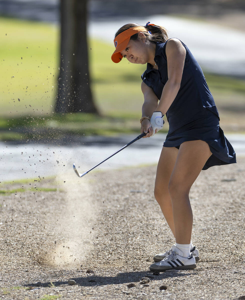 Bishop Gorman's Sol Choi chips out of a rocky path during the final round of the 5A girls ...
