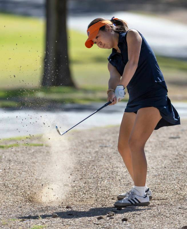 Bishop Gorman's Sol Choi chips out of a rocky path during the final round of the 5A girls ...