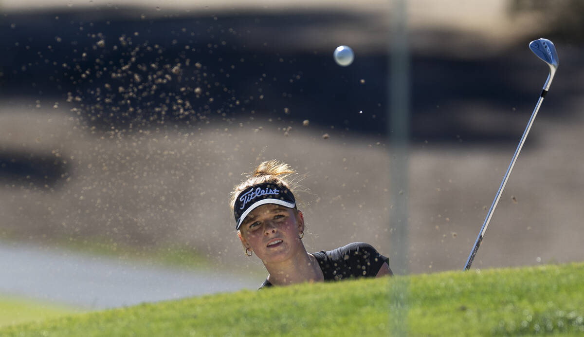 Palo Verde's Rivers Common eyes her ball wedged out of the sand during the final round of ...