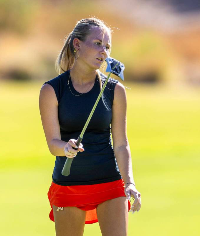 Coronado's Berlin Biddinger follows a putt during the final round of the 5A girls golf Sou ...