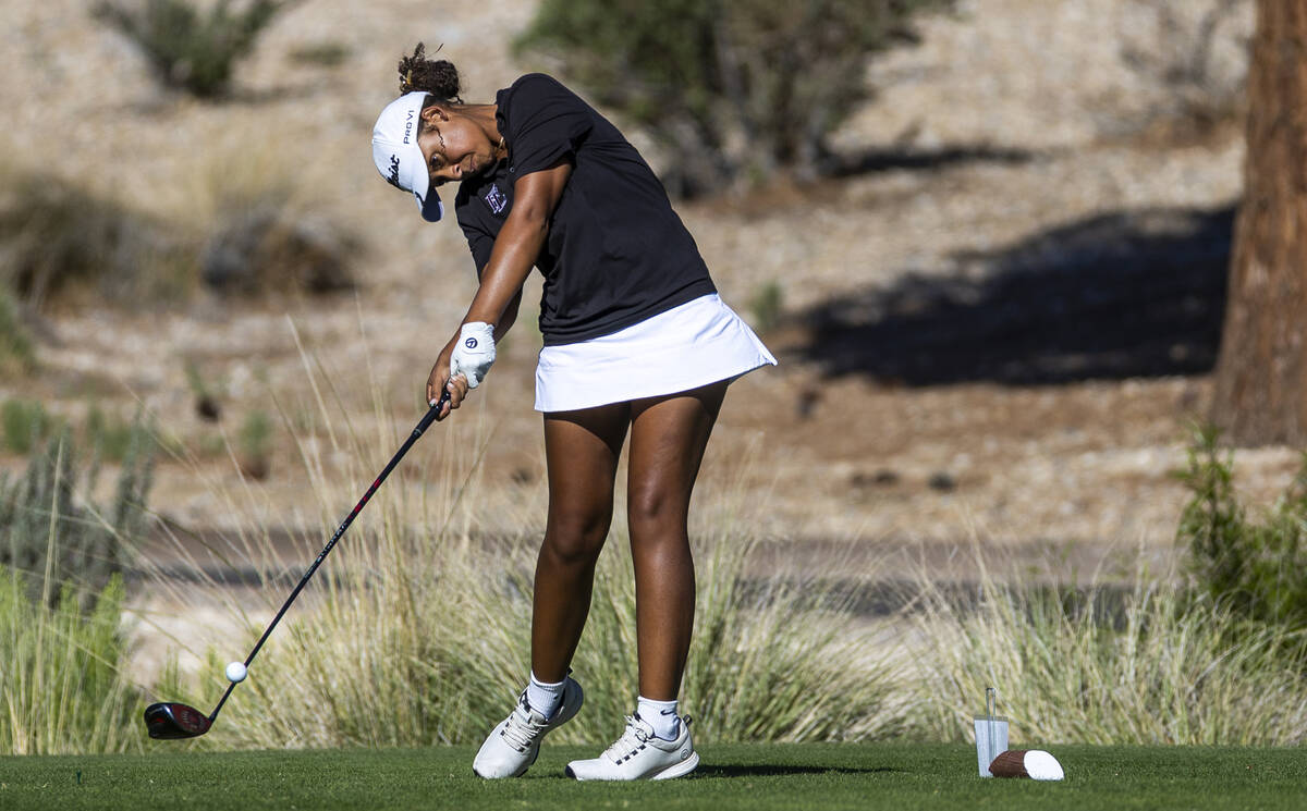 Faith Lutheran's Macy Garth blasts a ball off the tee during the final round of the 5A gir ...