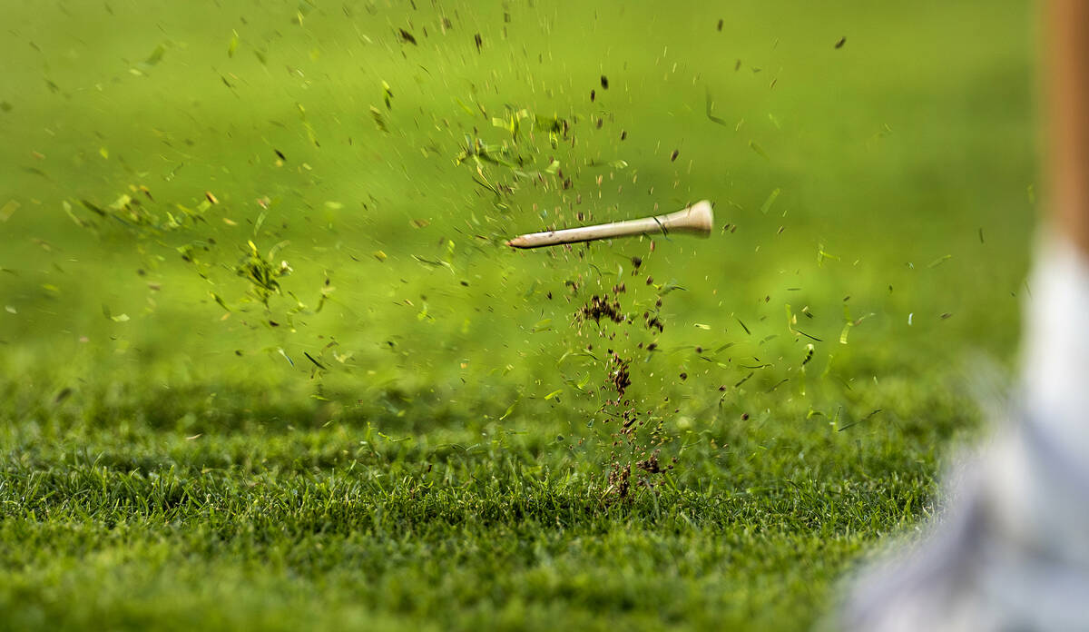 A tee goes flying amongst grass as Coronado's Berlin Biddinger tees off on the back nine d ...
