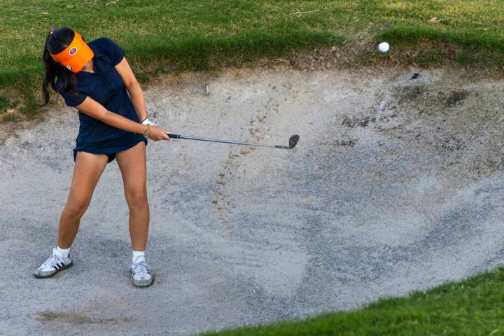 Bishop Gorman's Sol Choi blasts out of the sand during the final round of the 5A girls gol ...