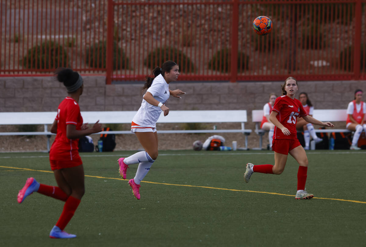 Bishop Gorman's Mikayla LeCavalier (17) heads the ball during a soccer game at Doral Acade ...