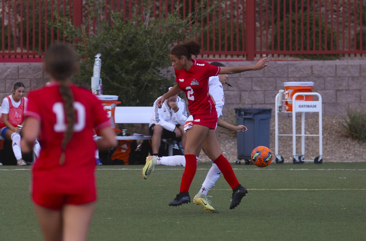 Doral Academy's Jaya Roberts-Smith (2) collides with Bishop Gorman's Stella Corrado-B ...