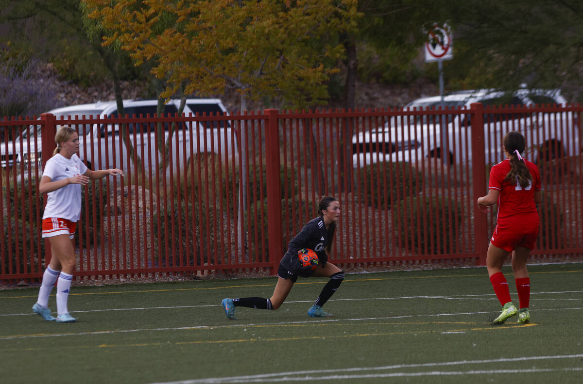 Bishop Gorman goalkeeper Lyvea Caceres (1) stops a shot during a soccer game at Doral Academy o ...