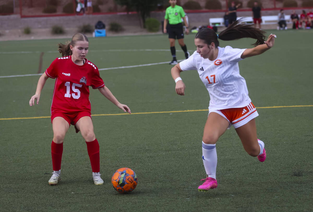 Doral Academy's midfielder Taylor Nuckoles (15) and Bishop Gorman's midfielder Mikayl ...