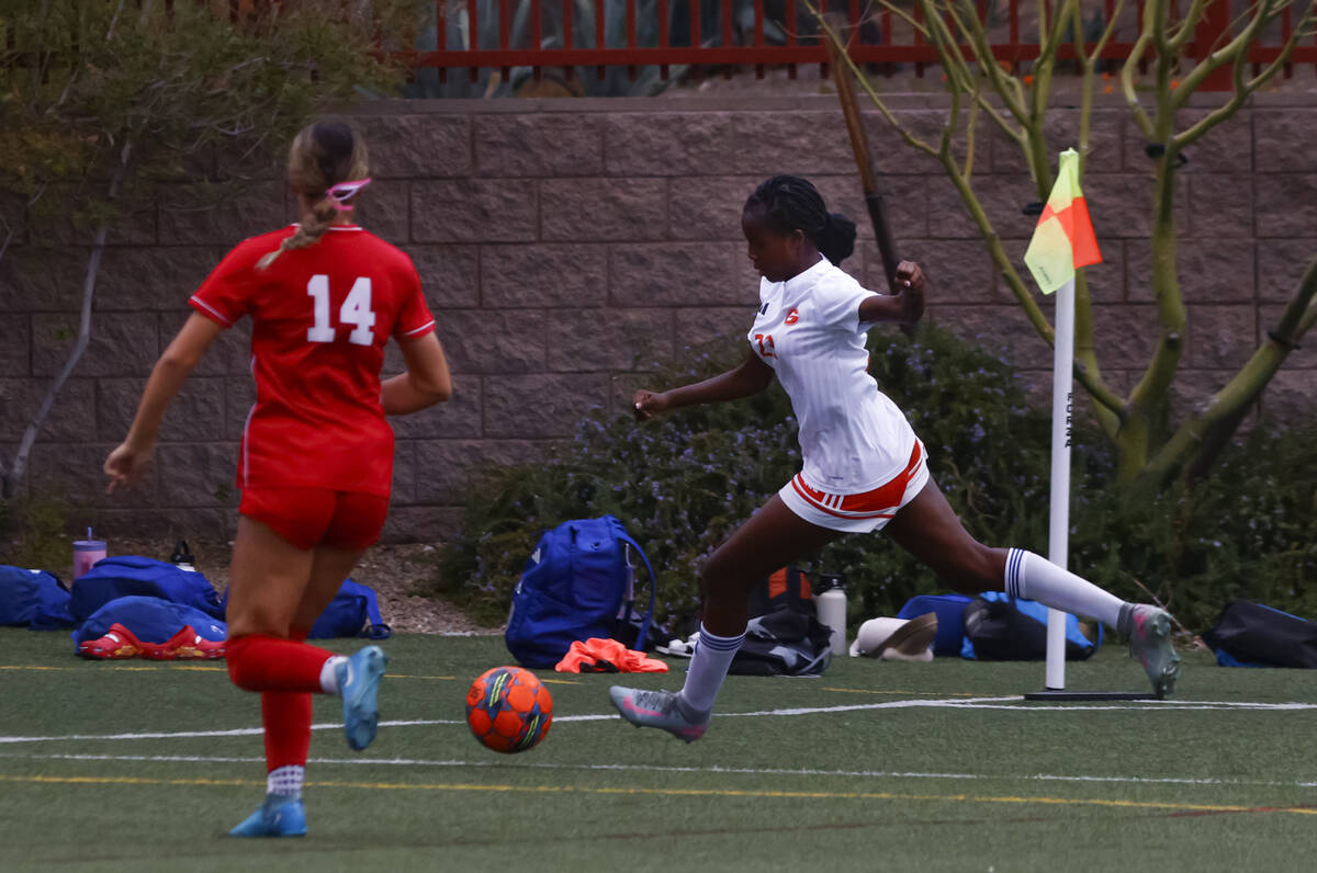 Bishop Gorman's Aleah Warner (23) lines up a shot against Doral Academy during a soccer ga ...