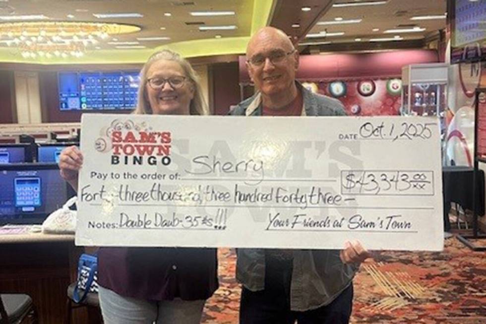 Sherry, left, celebrates with Ed after winning the Double Daub Progressive Jackpot for $43,343 ...