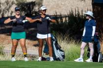 Palo Verde's Sage Perry and Faith Lutheran's Macy Garth flap their arms like birds as ...