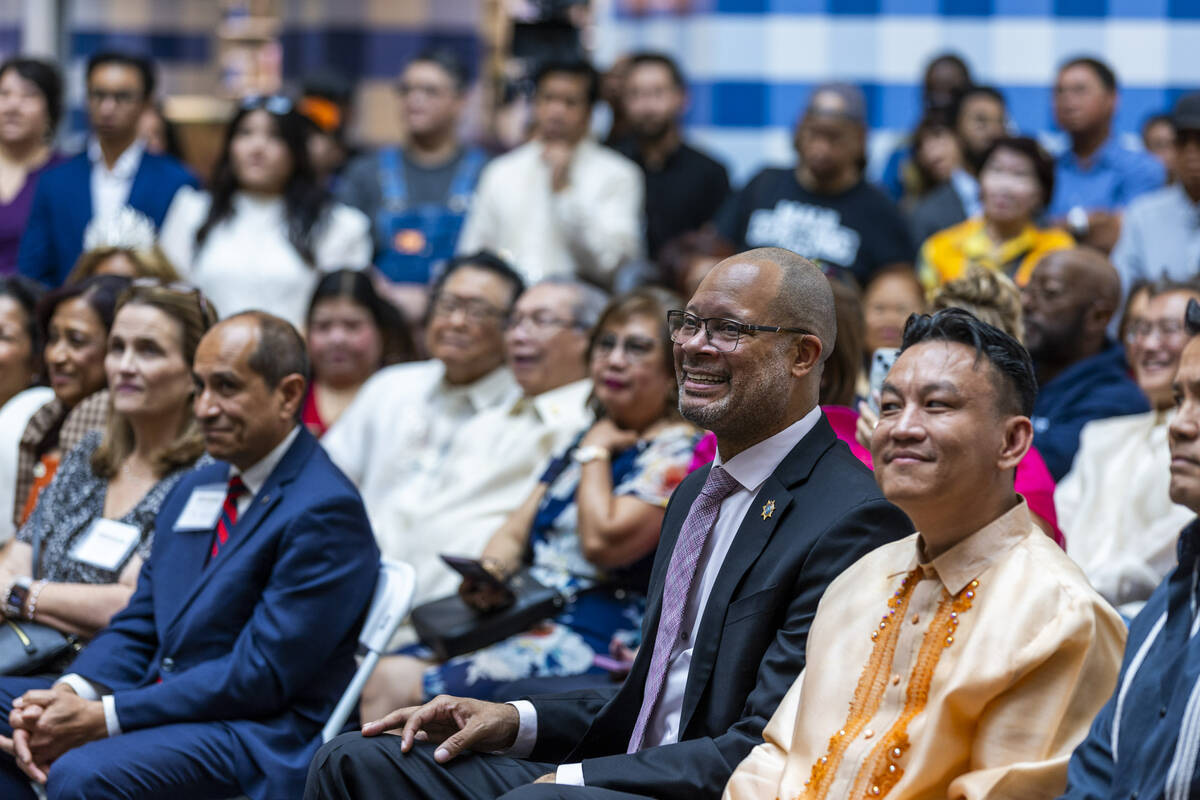 Attorney General Aaron Ford joins other community members as Clark County celebrates the sign u ...