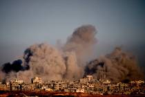 Smoke rises following an Israeli military strike in the northern Gaza Strip, seen from southern ...