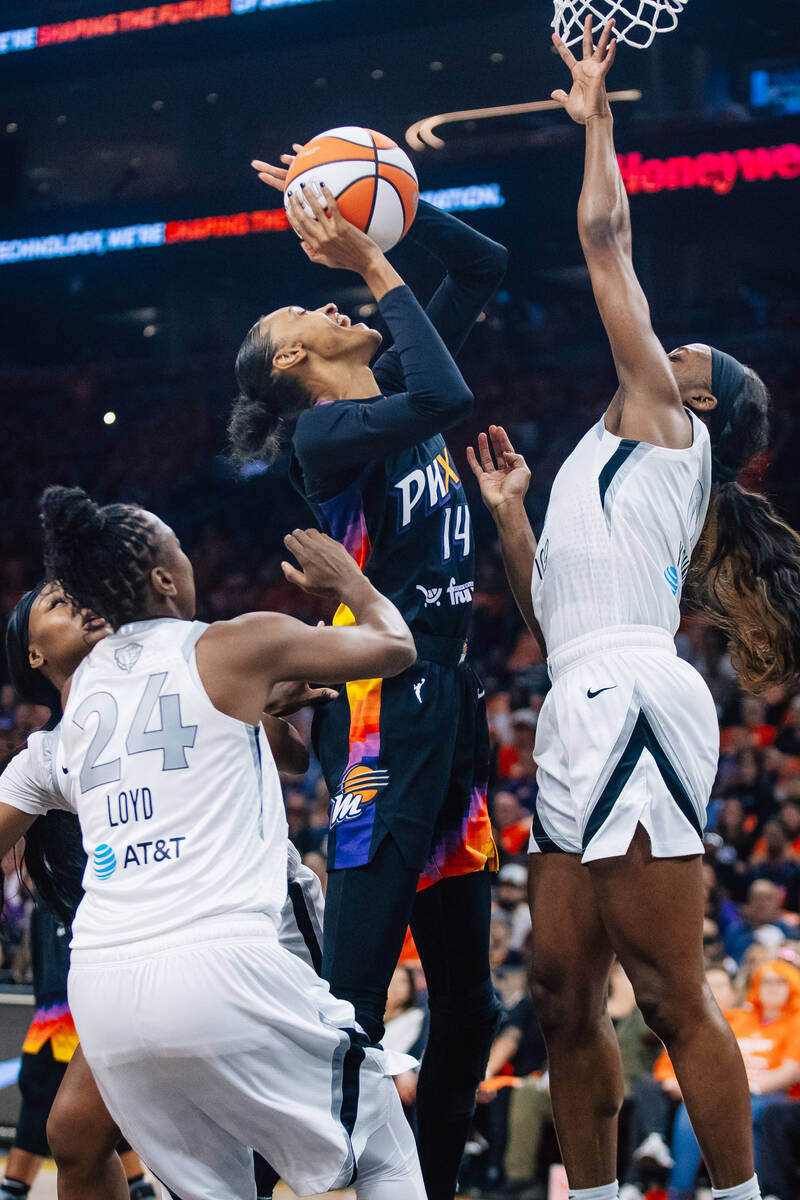 Phoenix Mercury forward DeWanna Bonner (14) goes up for a shot during game three of a WNBA fina ...