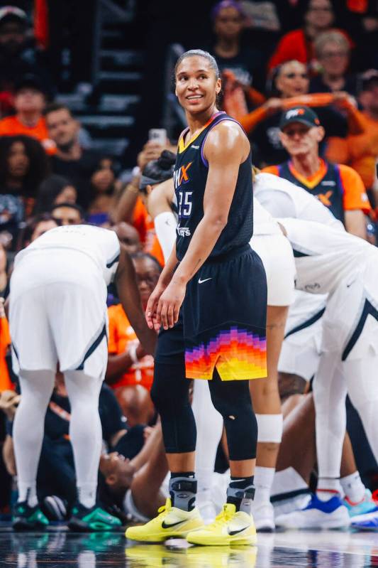 Phoenix Mercury forward Alyssa Thomas (25) smiles as a foul is called on her as the Aces help u ...